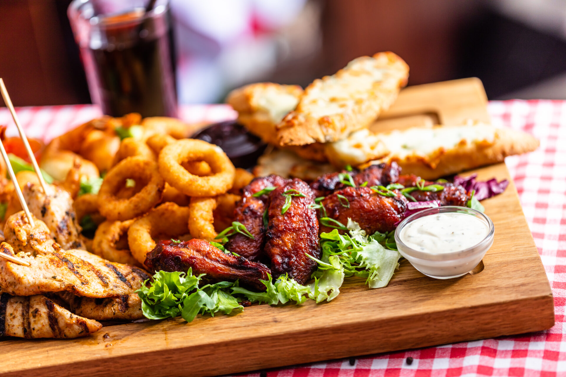 Delicious meal served on stylish wooden board - The Lower Bell Inn